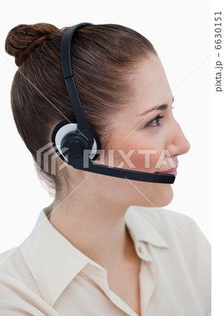 Portrait of an operator posing with a headset 6630151