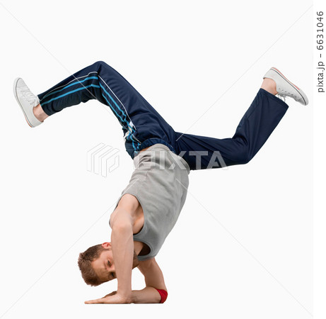 Break dancer doing a hand stand Break dancer doing a hand stand 6631046