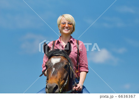 happy woman on horse 6636367