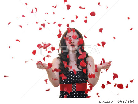 woman with falling rose petals 6637864