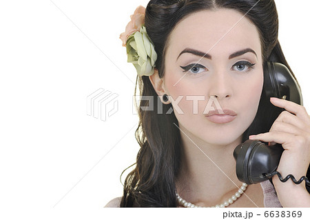 pretty girl talking on old phone pretty girl talking on old phone 6638369