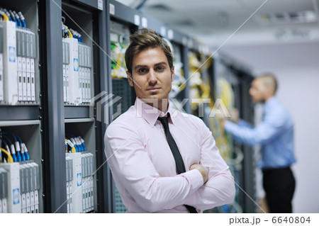 it engineers in network server room 6640804