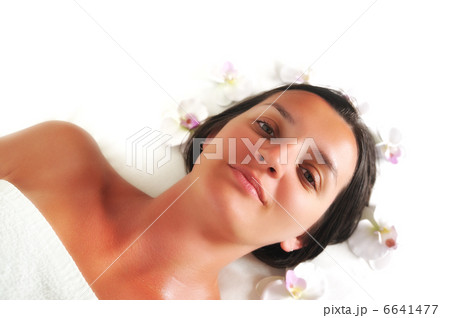 beautiful woman have massage at spa and wellness center beautiful woman have massage at spa and wellness center 6641477