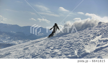 freestyle snowboarder jump and ride 6641815