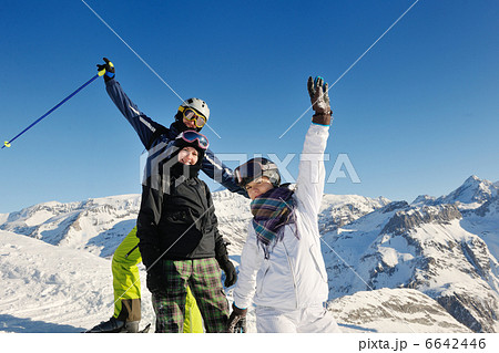 winter portrait of friends at skiing winter portrait of friends at skiing 6642446