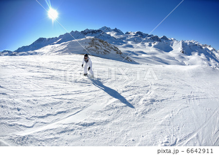skiing on fresh snow at winter season at beautiful sunny day skiing on fresh snow at winter season at beautiful sunny day 6642911