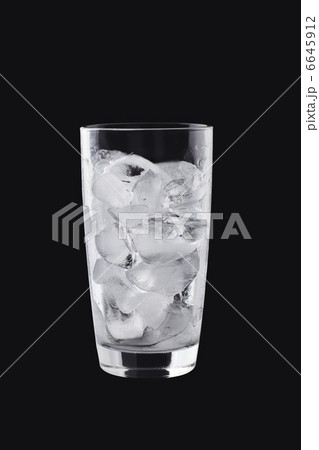A glass with ice cubes A glass with ice cubes 6645912