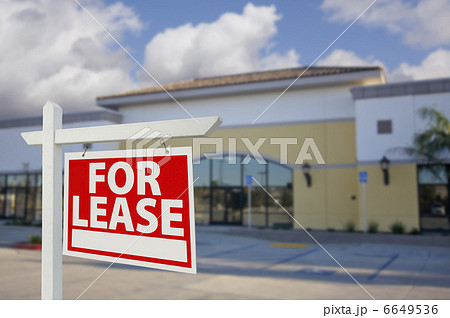 Vacant Retail Building with For Lease Real Estate Sign 6649536