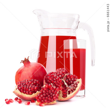 Pomegranate fruit juice in glass pitcher Pomegranate fruit juice in glass pitcher 6661443