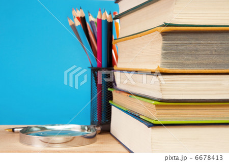 book, magnifier and holder basket with pencils 6678413