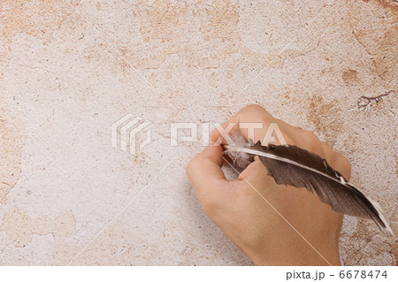 writing male hand with feather 6678474