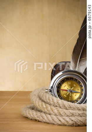 ship ropes and compass on wood 6679143