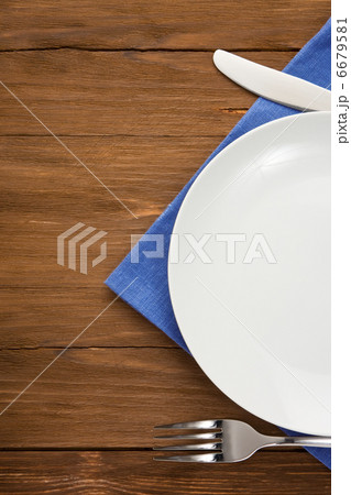 plate, knife and fork on wood plate, knife and fork on wood 6679581