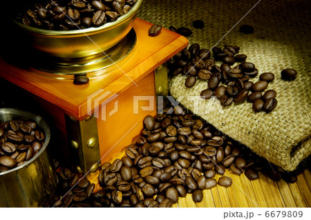 grinder,coffee beans, pot on sacking 6679809