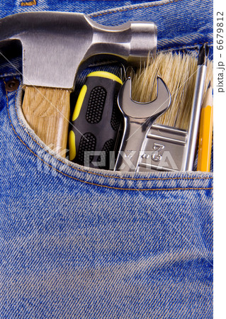 set of tools and instruments in old jeans 6679812