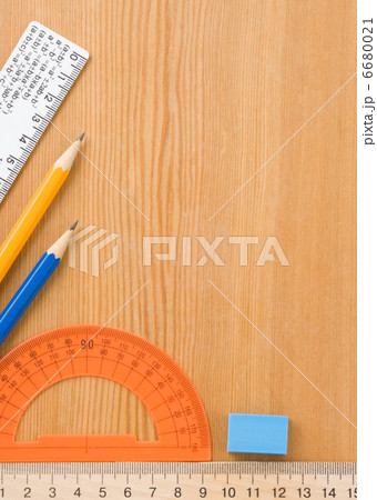school accessories and supplies on wooden 6680021