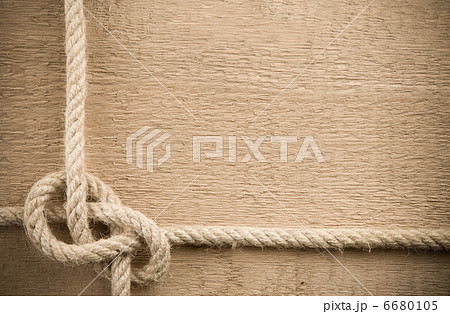ship ropes on wood background 6680105