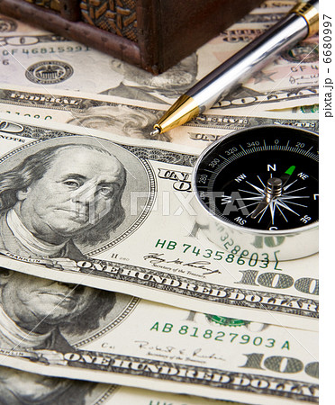 ink pen and compass on dollars ink pen and compass on dollars 6680997