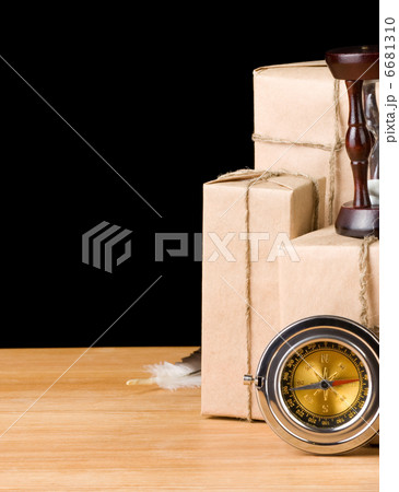 parcel wrapped packaged box isolated on black 6681310