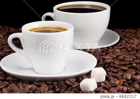 white cups of coffee on beans 6682217