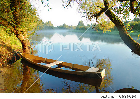 Beautiful river and yellow boat Beautiful river and yellow boat 6686694