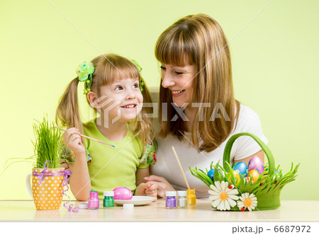 mother with child girl play and paint easter eggs 6687972