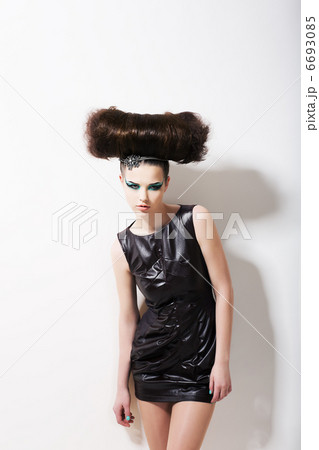 Modern Style. Funny Glamorous Fashion Model with Punk Coiffure. Creativity 6693085