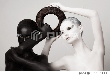 Women in Ying Yang Style. Occult Contrast Make-up. Unity Women in Ying Yang Style. Occult Contrast Make-up. Unity 6693111