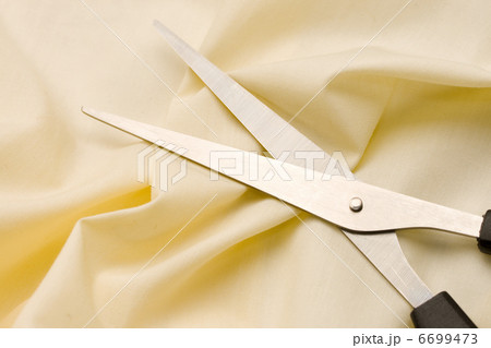 Textile background and scissors 6699473