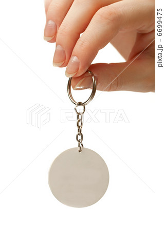 Female hand with blank badge 6699475