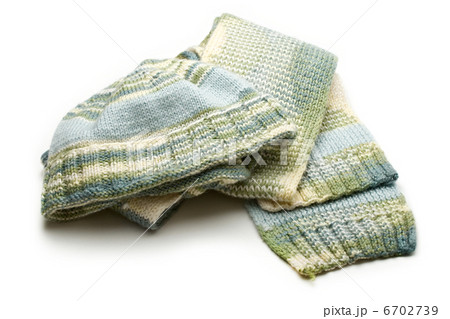 Set of a cap and a scarf on white Set of a cap and a scarf on white 6702739