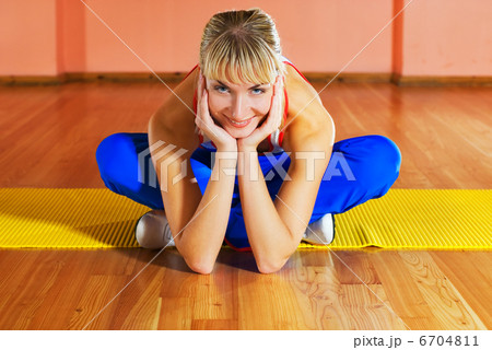 Fitness trainer relaxing after exercise 6704811