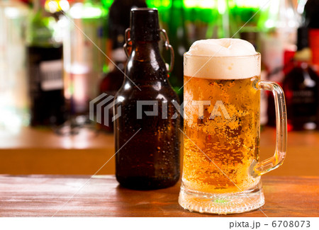 mug of beer and bottle 6708073