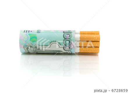 Cigarettes and money on a white background close-up 6728659