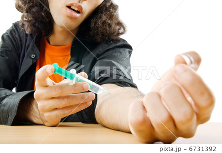 Drug addict during injection 6731392