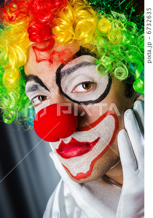Funny clown in studio shooting 6732635
