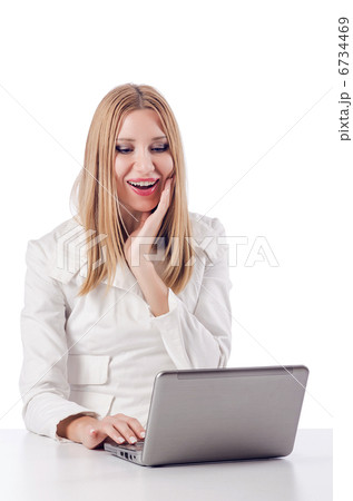 Woman with laptop on white 6734469