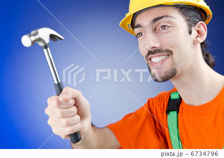 Man with hammer in studio 6734796