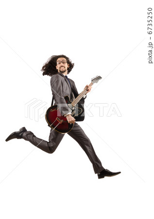 Guitar player in business suit on white 6735250