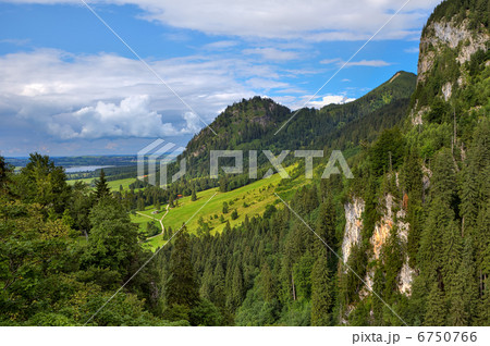 Green meadow among mountains in Bavaria, Germany. 6750766