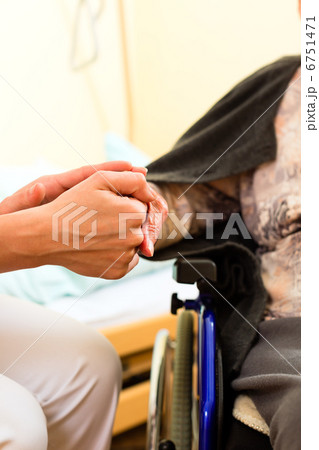 Young nurse and female senior in nursing home Young nurse and female senior in nursing home 6751471
