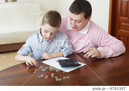Father training the son to the finance Father training the son to the finance 6761387