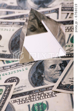 pyramid on dollars. macro close-up 6768019