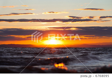 sunset at coast of the sea 6768095