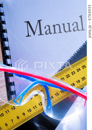 Ruler, manual, handsaw and goggles Ruler, manual, handsaw and goggles 6768935
