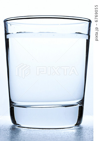 Glass of water on white background Glass of water on white background 6769055