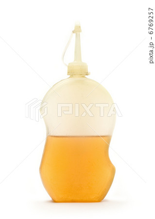 Lube in plastic bottle on white Lube in plastic bottle on white 6769257