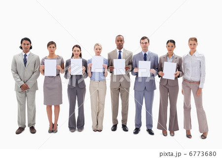 Business people holding six supports for letters 6773680