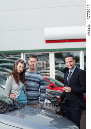 Clients buying a new car Clients buying a new car 6775945