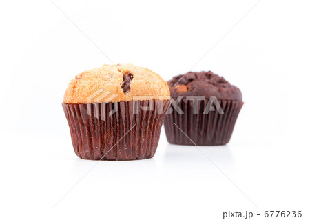 Two fresh baked muffins 6776236
